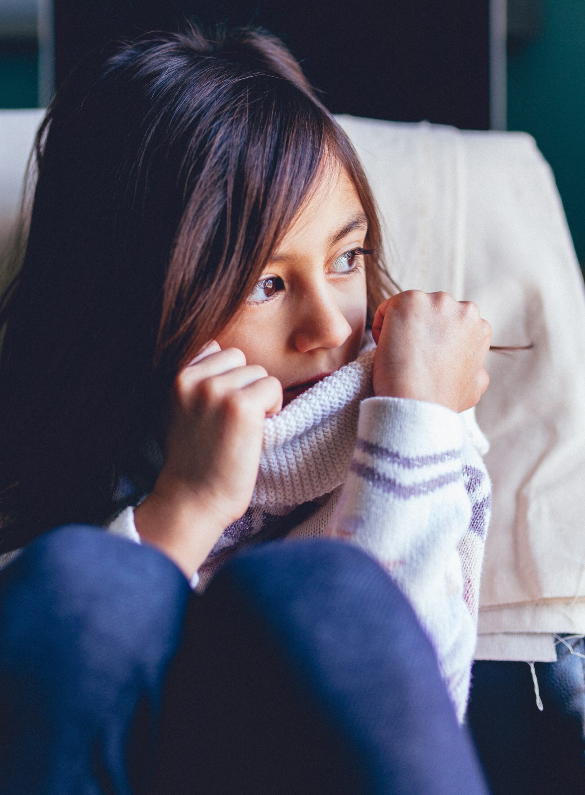 young female sitting on the floor upset